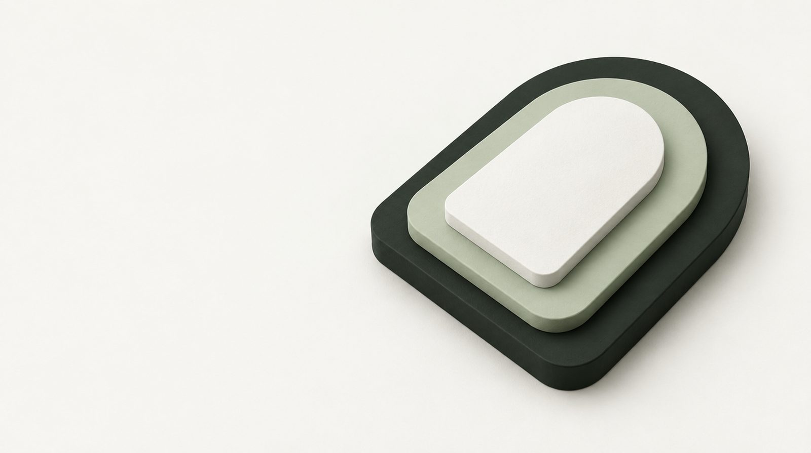 Three nested matte slabs in green-black, sage and off-white, stacked like the layers of a vault door